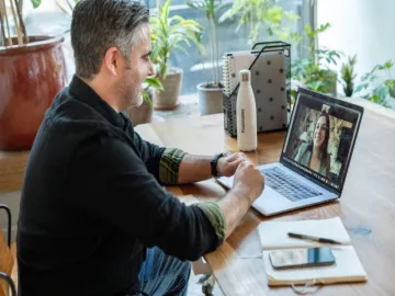 an employee on a Zoom call while working from home 